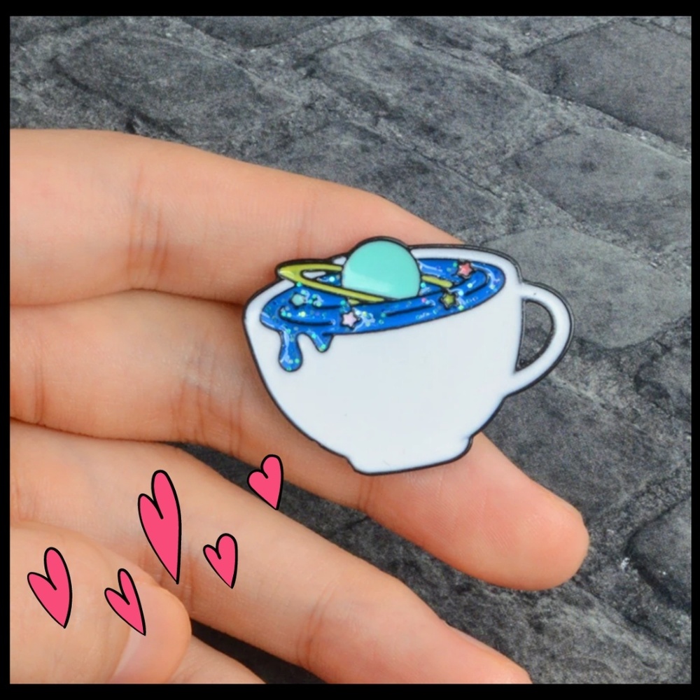 Trippy Festival Universe in a Mug pin.